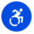 Une icône circulaire bleue avec une silhouette blanche assise dans un fauteuil roulant.

